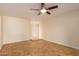 Living room with tile flooring and a ceiling fan at 2705 W Summit Pl, Chandler, AZ 85224