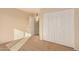 Bright bedroom with double-door closet and neutral walls at 2705 W Summit Pl, Chandler, AZ 85224