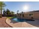 Inviting kidney-shaped pool in a sunny backyard setting at 2705 W Summit Pl, Chandler, AZ 85224