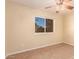 Spacious bedroom with ceiling fan and neutral carpeting at 2705 W Summit Pl, Chandler, AZ 85224