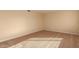 Well-lit bedroom featuring neutral wall paint and carpet at 2705 W Summit Pl, Chandler, AZ 85224