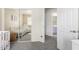 Bedroom with mirrored closet and view into another room at 1515 E South Fork Dr, Phoenix, AZ 85048