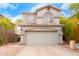 Two-story house with attached garage at 1515 E South Fork Dr, Phoenix, AZ 85048