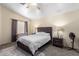 Comfortable bedroom with ceiling fan and plenty of closet space at 1515 E South Fork Dr, Phoenix, AZ 85048