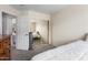 Bedroom with mirrored closet and access to bathroom at 1515 E South Fork Dr, Phoenix, AZ 85048