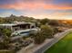Luxury estate with expansive backyard, pool and patio, offering stunning desert views at 10422 E Mark Ln, Scottsdale, AZ 85262