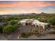 Luxury home with expansive backyard, situated on a golf course with mountain views at 10422 E Mark Ln, Scottsdale, AZ 85262