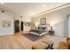 Luxury main bedroom with access to a private balcony at 10422 E Mark Ln, Scottsdale, AZ 85262