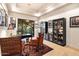 Spacious home office with built-in shelves and scenic views at 10422 E Mark Ln, Scottsdale, AZ 85262