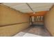One-car garage with brick walls and overhead storage at 5850 W Cheery Lynn Rd, Phoenix, AZ 85031