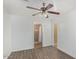 Bedroom with wood-look flooring and access to a bathroom at 5850 W Cheery Lynn Rd, Phoenix, AZ 85031