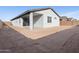 View of the home's exterior, showcasing a clean and simple design at 2605 E San Miguel Dr, Casa Grande, AZ 85194