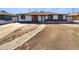 Ranch style home with a brick walkway and a large yard at 4322 N 50Th Dr, Phoenix, AZ 85031