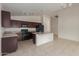 Kitchen with granite countertops and dark wood cabinets at 727 W Judi Dr, Casa Grande, AZ 85122