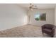 Light and airy bedroom with a ceiling fan and wood-look floors at 727 W Judi Dr, Casa Grande, AZ 85122