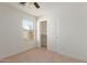 Bright bedroom with a window, closet and ceiling fan at 727 W Judi Dr, Casa Grande, AZ 85122