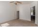 Spacious bedroom with carpeted floor and ceiling fan at 727 W Judi Dr, Casa Grande, AZ 85122