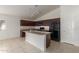 Modern kitchen with granite countertops and stainless steel appliances at 727 W Judi Dr, Casa Grande, AZ 85122
