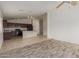 Modern kitchen features granite countertops, dark wood cabinets, and a breakfast bar at 727 W Judi Dr, Casa Grande, AZ 85122