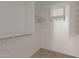 Large walk-in closet with shelving and hanging rods at 727 W Judi Dr, Casa Grande, AZ 85122