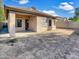 Large backyard with covered patio and block wall at 11575 W Buchanan St, Avondale, AZ 85323