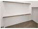 Large walk-in closet with shelving and hanging rods at 11575 W Buchanan St, Avondale, AZ 85323