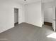 Spacious bedroom with neutral carpeting and closet at 11575 W Buchanan St, Avondale, AZ 85323