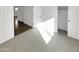 Bright bedroom with carpet flooring and walk-in closet at 11575 W Buchanan St, Avondale, AZ 85323