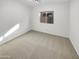 Simple bedroom with neutral walls and carpet flooring at 11575 W Buchanan St, Avondale, AZ 85323