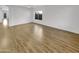 Spacious living room with hardwood floors and plenty of natural light at 11575 W Buchanan St, Avondale, AZ 85323