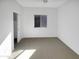Spacious bedroom with carpet flooring and a large closet at 11575 W Buchanan St, Avondale, AZ 85323