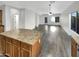 Spacious living room with hardwood floors and access to backyard at 11575 W Buchanan St, Avondale, AZ 85323