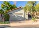 Tan house with a two car garage and nicely landscaped yard at 2114 S El Marino --, Mesa, AZ 85202