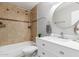 Updated bathroom with a tub, shower, and white vanity at 2114 S El Marino --, Mesa, AZ 85202