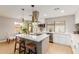 Modern kitchen with white cabinets and large island at 2114 S El Marino --, Mesa, AZ 85202