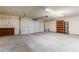 Attached garage with shelving and extra storage at 2114 S El Marino --, Mesa, AZ 85202