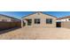 House exterior and empty lot backyard at 16173 S 181St Ave, Goodyear, AZ 85338