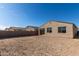 House exterior and empty lot backyard at 16173 S 181St Ave, Goodyear, AZ 85338
