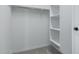 Walk in closet with shelving and hanging rod at 16173 S 181St Ave, Goodyear, AZ 85338