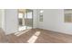 Living room with sliding door access to the backyard at 16173 S 181St Ave, Goodyear, AZ 85338