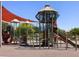 A colorful playground with various equipment for enjoyment at 2688 E San Miguel Dr, Casa Grande, AZ 85194