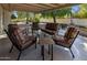Covered patio with seating area and view of backyard at 9856 W Rimrock Dr, Peoria, AZ 85382