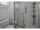 Clean bathroom with a shower stall and storage at 9856 W Rimrock Dr, Peoria, AZ 85382