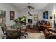 Relaxing living area with fireplace and leather sofa at 9856 W Rimrock Dr, Peoria, AZ 85382