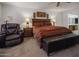 Spacious bedroom with comfortable seating and ample storage at 9856 W Rimrock Dr, Peoria, AZ 85382