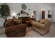 Bright and airy living room with comfortable seating area at 9856 W Rimrock Dr, Peoria, AZ 85382