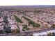 Community overview showcasing homes, landscaping, and a golf course at 9856 W Rimrock Dr, Peoria, AZ 85382