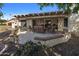 Spacious patio features comfortable seating and a pergola at 9856 W Rimrock Dr, Peoria, AZ 85382