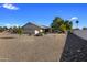 Spacious backyard with gravel and rock landscaping, offering privacy and ample space at 9856 W Rimrock Dr, Peoria, AZ 85382