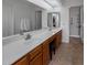 Elegant bathroom with double sinks and a walk-in shower at 9856 W Rimrock Dr, Peoria, AZ 85382